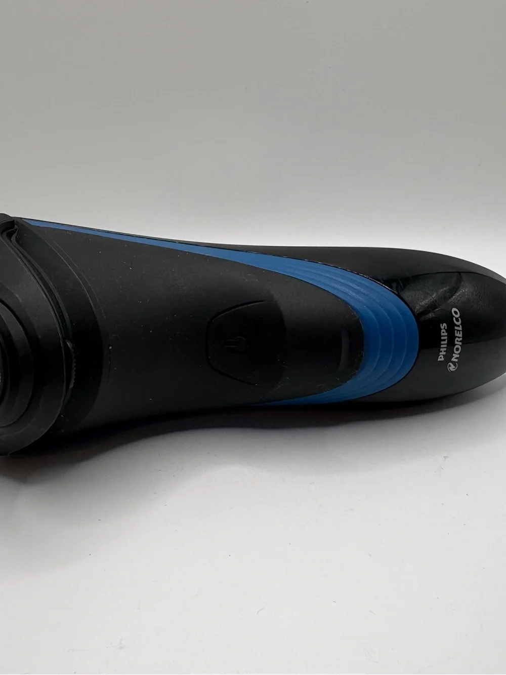 Philips Norelco Shaver 2100 cordless electric rotary razor in black with blue ac